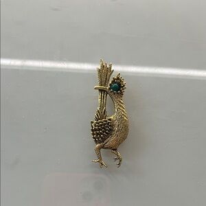 Ambassador Gold Bird Brooch with Green Gem